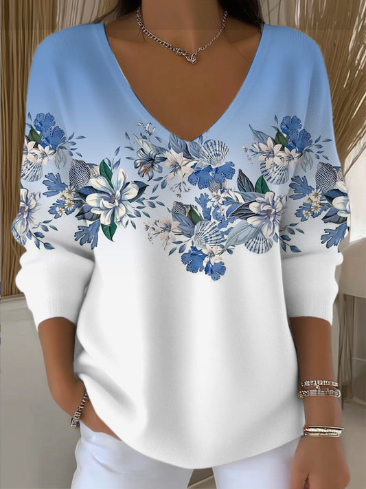 Dámské elegantní modrobílý květinový svetr s v krkem