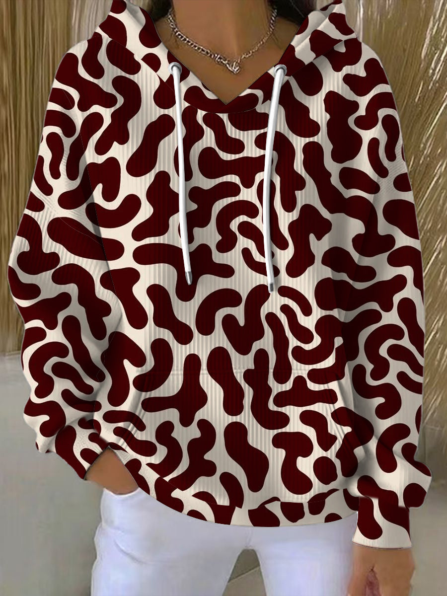 Ženská odvážná červeněbéžová mikina